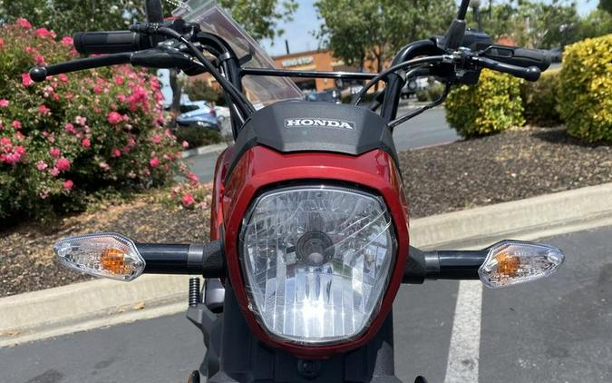 2025 Honda® Navi Pearl Red