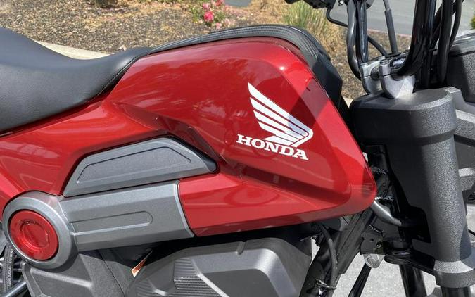 2025 Honda® Navi Pearl Red