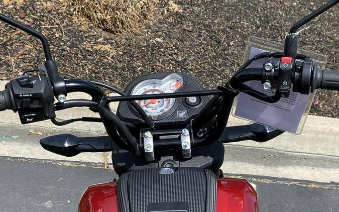 2025 Honda® Navi Pearl Red