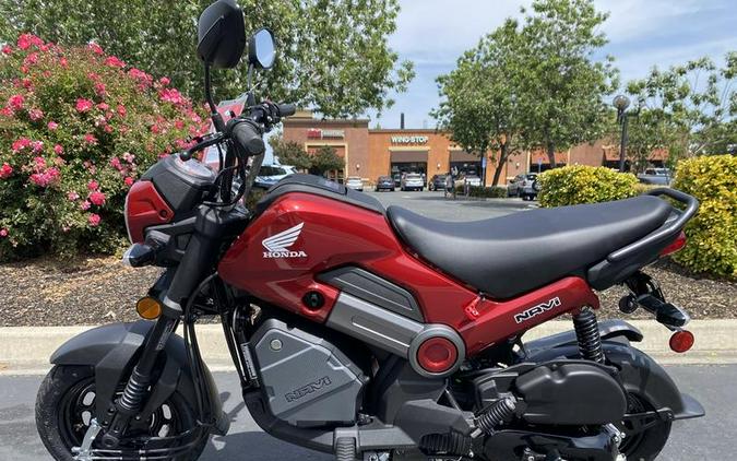 2025 Honda® Navi Pearl Red