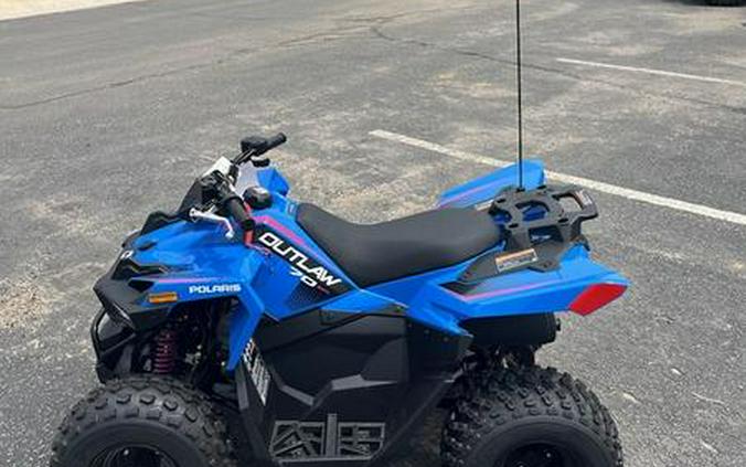 2024 Polaris® Outlaw 70 EFI Velocity Blue/ Fierce Fuscia