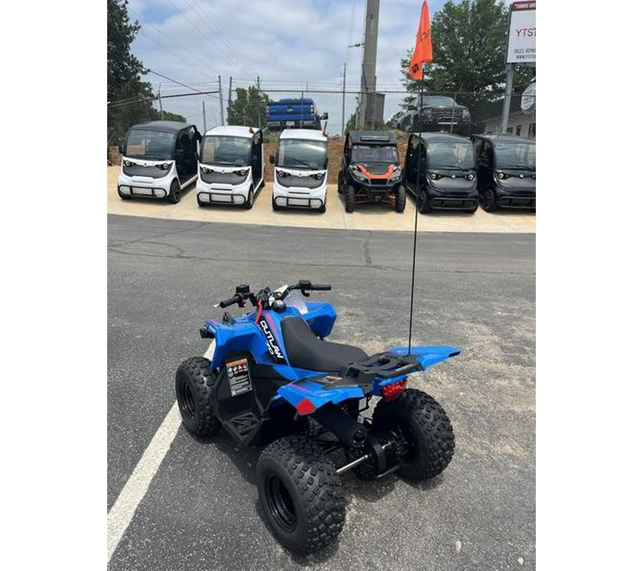 2024 Polaris® Outlaw 70 EFI Velocity Blue/ Fierce Fuscia