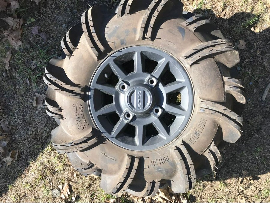 14" Stock aluminum rims with 29" Outlaw II tires - Polaris