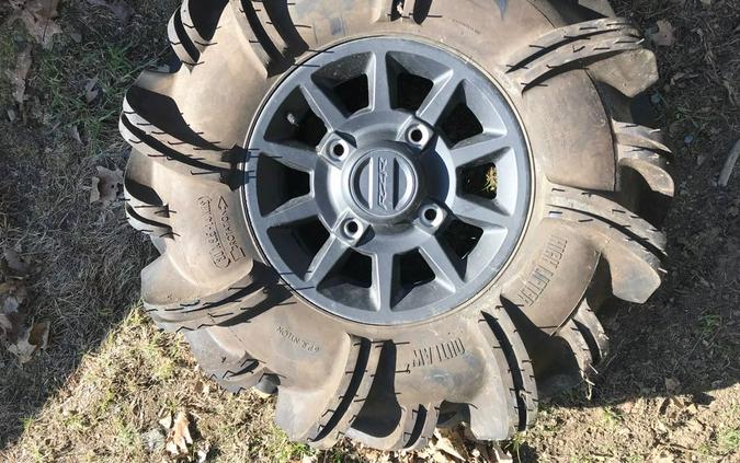 14" Stock aluminum rims with 29" Outlaw II tires - Polaris