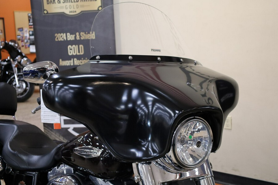 2014 Harley-Davidson® Switchback™ BLACKND CAYENNE FLD103