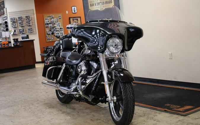 2014 Harley-Davidson® Switchback™ BLACKND CAYENNE FLD103