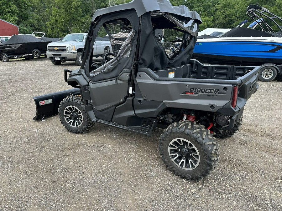 2017 Honda PIONEER 1000. Power steering, plow and full cab!