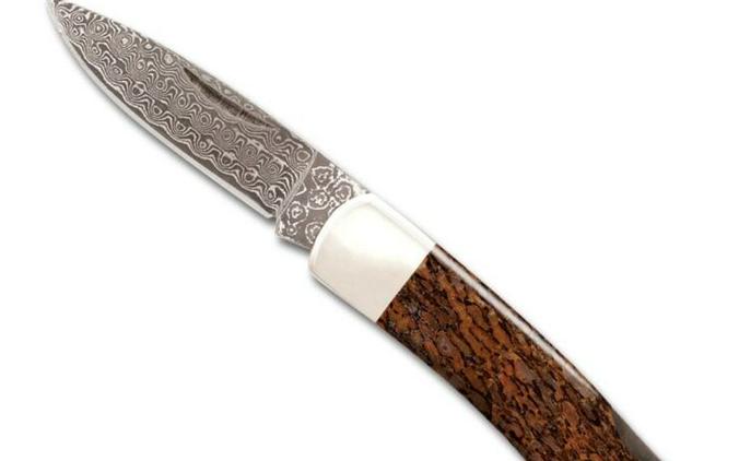A Pocket Knife With A Fossilized Woolly Mammoth Bone Handle – $105 USD