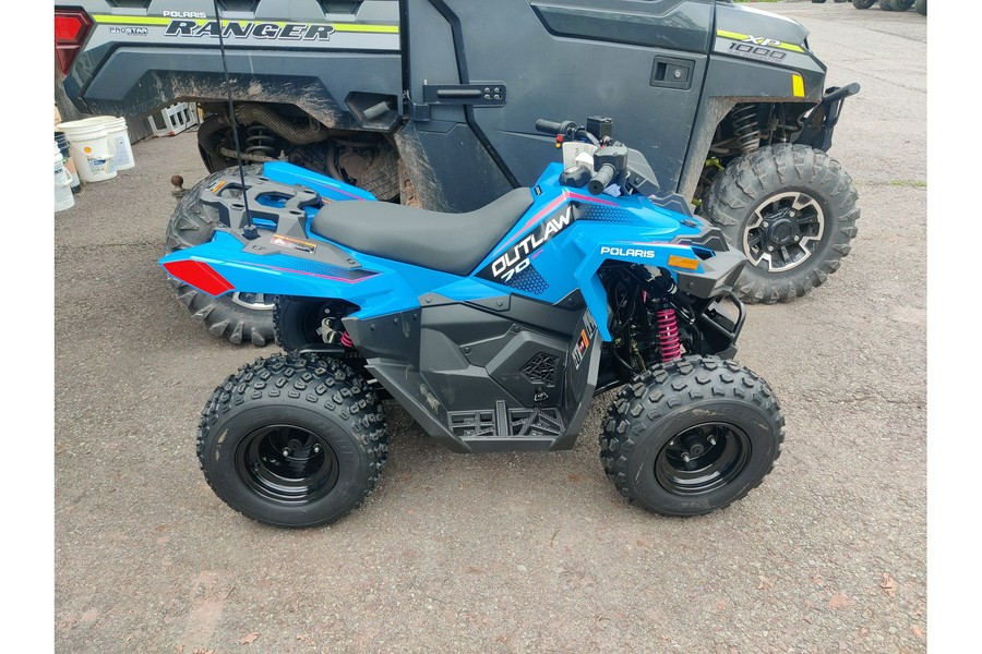 2024 Polaris Industries Outlaw® 70 EFI Velocity Blue and Fierce Fuchsia