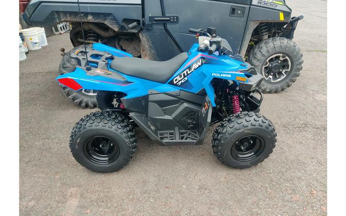 2024 Polaris Industries Outlaw® 70 EFI Velocity Blue and Fierce Fuchsia