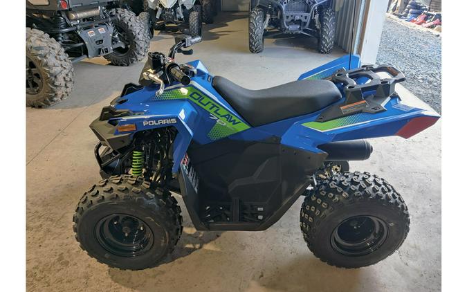 2025 Polaris Industries Outlaw® 70 EFI Velocity Blue & Lifted Lime