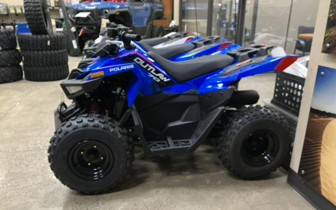 2024 Polaris Industries OUTLAW 70 EFI VELOCITY BLUE / FIERCE FUSCIA