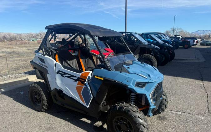 2024 Polaris RZR Trail Ultimate - Storm Blue / White Lightning.