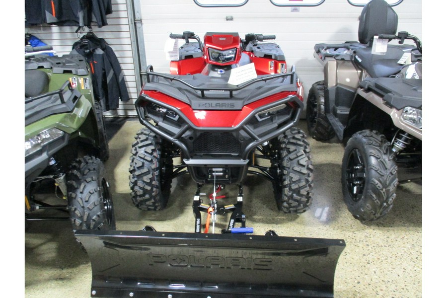 2026 Polaris Sportsman 570 Trail Sunset Red (Shown with optional plow.)