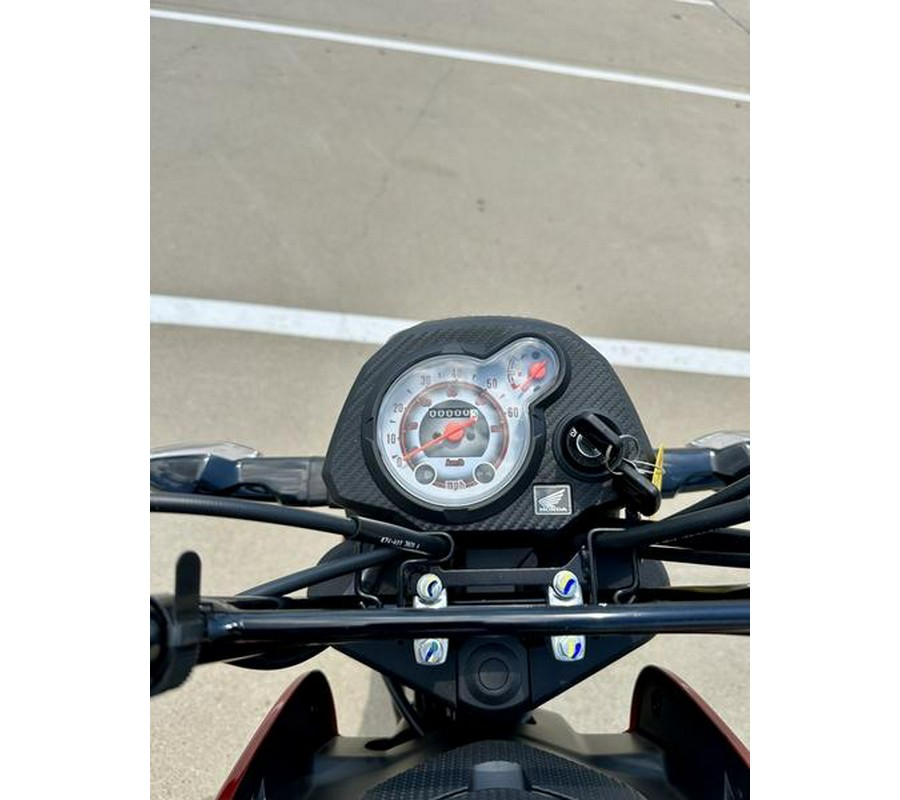 2025 Honda® Navi Pearl Red