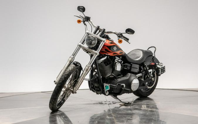 2010 HARLEY-DAVIDSON FXDWG WIDE GLIDE in Black w/ Flames with 16,100 miles