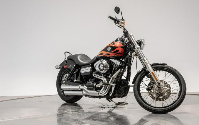 2010 HARLEY-DAVIDSON FXDWG WIDE GLIDE in Black w/ Flames with 16,100 miles