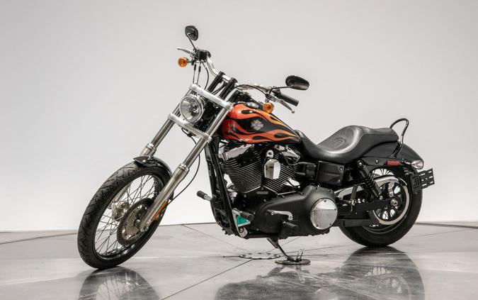 2010 HARLEY-DAVIDSON FXDWG WIDE GLIDE in Black w/ Flames with 16,100 miles