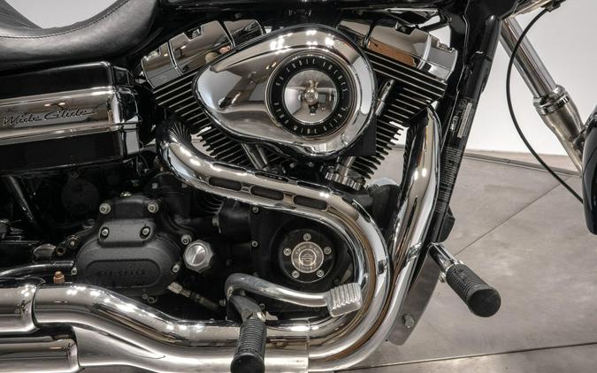 2010 HARLEY-DAVIDSON FXDWG WIDE GLIDE in Black w/ Flames with 16,100 miles