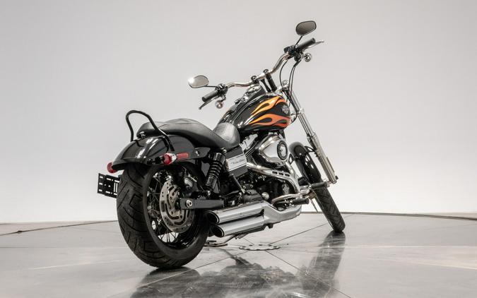 2010 HARLEY-DAVIDSON FXDWG WIDE GLIDE in Black w/ Flames with 16,100 miles