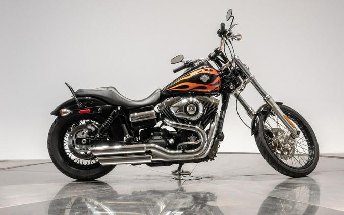 2010 HARLEY-DAVIDSON FXDWG WIDE GLIDE in Black w/ Flames with 16,100 miles