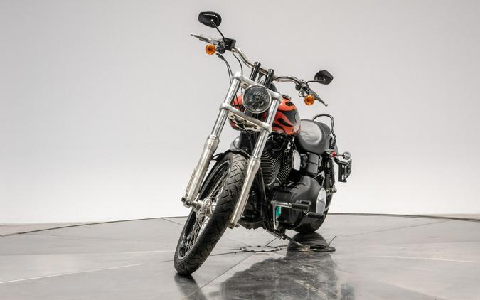 2010 HARLEY-DAVIDSON FXDWG WIDE GLIDE in Black w/ Flames with 16,100 miles