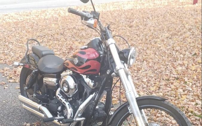 2010 HARLEY-DAVIDSON FXDWG WIDE GLIDE in Black w/ Flames with 16,100 miles