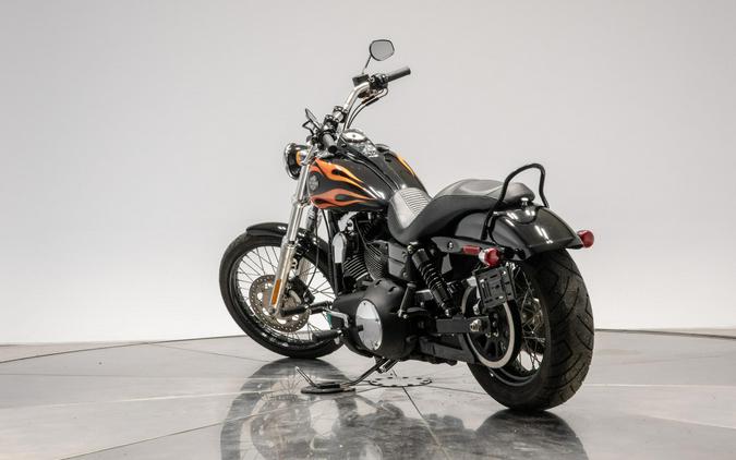 2010 HARLEY-DAVIDSON FXDWG WIDE GLIDE in Black w/ Flames with 16,100 miles