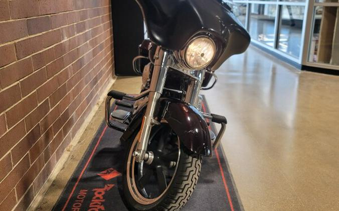 2014 Harley-Davidson® Switchback™ BLACKND CAYENNE FLD103