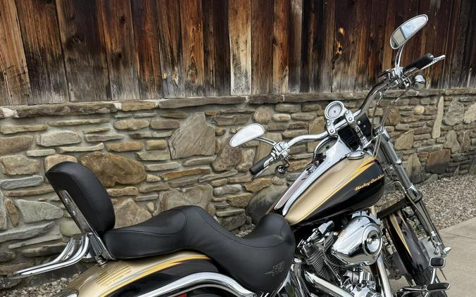 2003 Harley-Davidson® Screamin’ Eagle Softail Deuce Centennial Gold and Vivid Black with Gold Leaf G