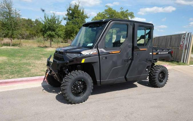 New 2024 POLARIS RANGER CREW XP 1000 NORTHSTAR ULTIMATE SUPER GRAPHITE WITH ORANGE BURST ACCENTS