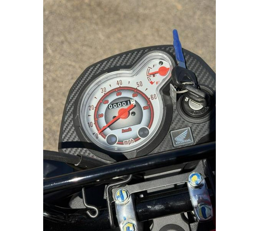 2025 Honda® Navi Pearl Red