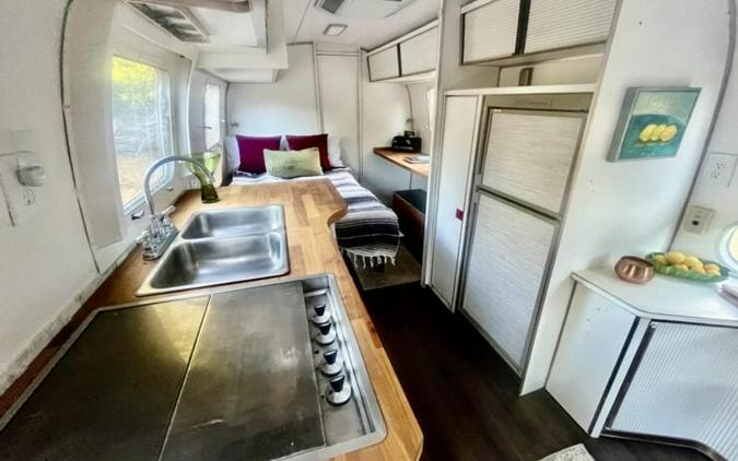 Retro Home-On-Wheels: A Refurbished 1972 Airstream “Land Yacht” Ambassador