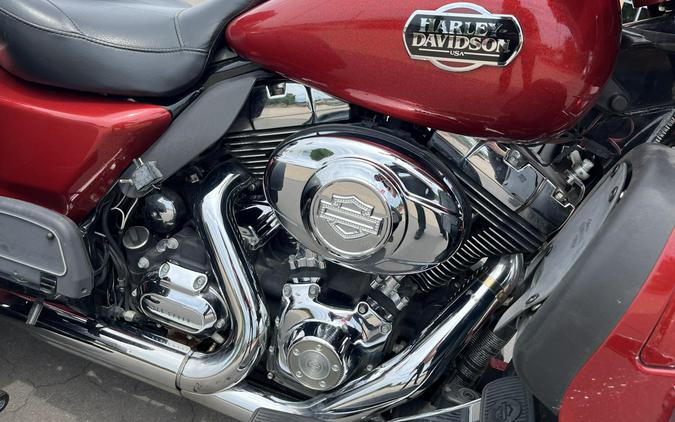 2013 Harley-Davidson® FLHTCUTG Tri Glide™ Ultra Classic® EMBR RED SUNGLO 854780