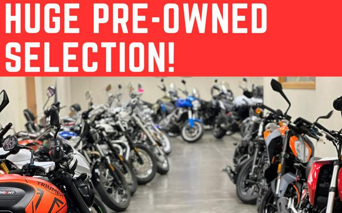 2025 Honda® Navi Pearl Red