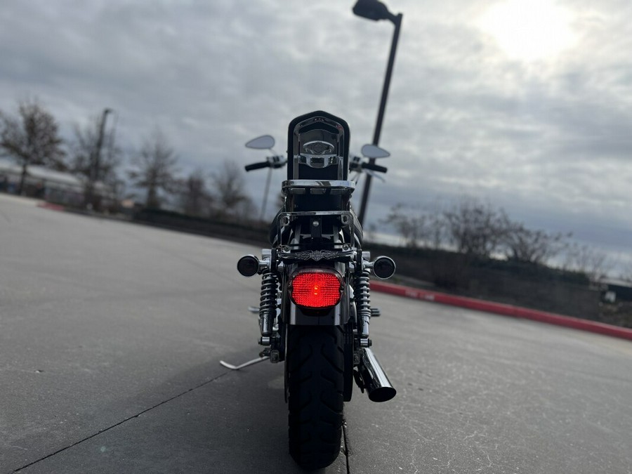 2003 Harley-Davidson® 1200 Custom XL1200C VIVID BLACK