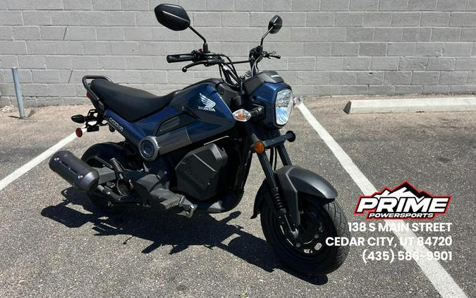 2024 Honda® Navi Pearl Red