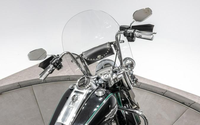 2014 HARLEY-DAVIDSON FLHR ROAD KING in Vivid Black w/ Pinstripe with 21,216 miles