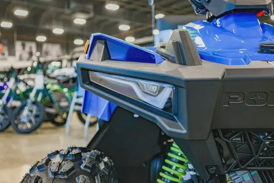 New 2025 POLARIS OUTLAW 70 EFI VELOCITY BLUE AND LIFTED LIME