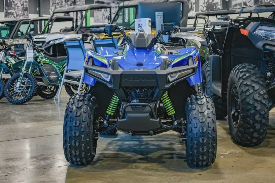 New 2025 POLARIS OUTLAW 70 EFI VELOCITY BLUE AND LIFTED LIME