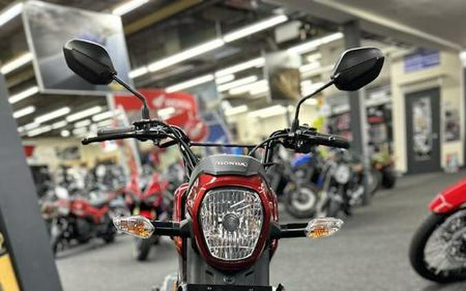 2024 Honda® Navi Pearl Red