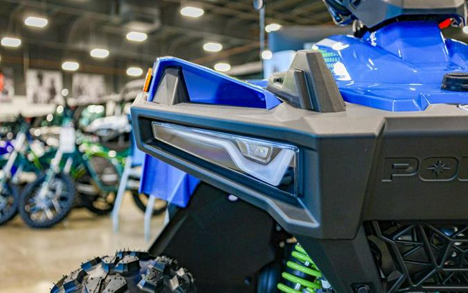 New 2025 POLARIS OUTLAW 70 EFI VELOCITY BLUE LIFTED LIME