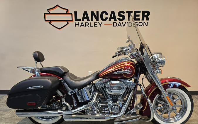 2014 Harley-Davidson® CVO™ Softail® Deluxe Crimson Sunglo/Ruby Flake FLSTNSE
