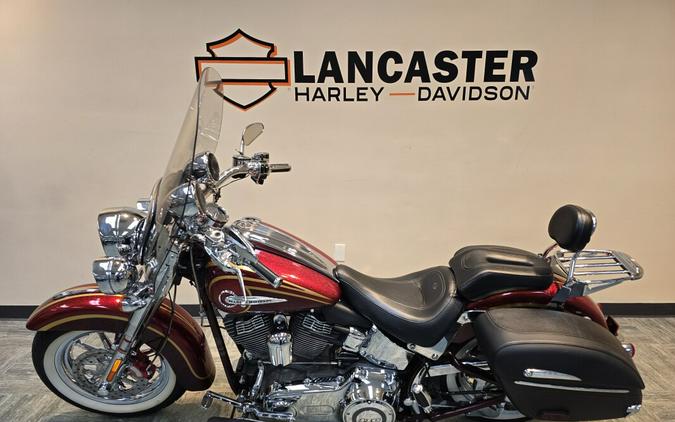 2014 Harley-Davidson® CVO™ Softail® Deluxe Crimson Red Sunglo and Ruby Flake FLSTNSE