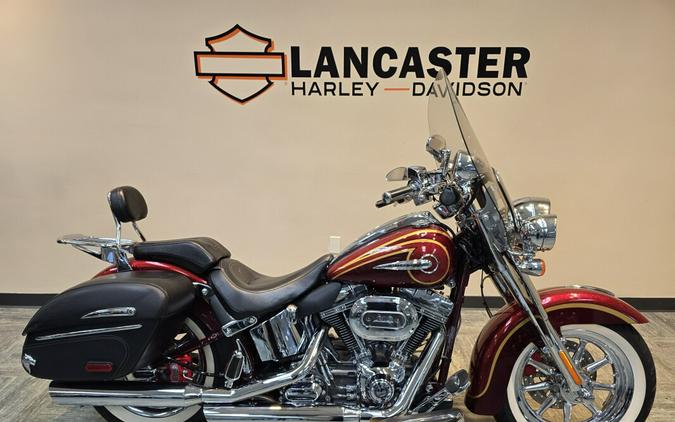 2014 Harley-Davidson® CVO™ Softail® Deluxe Crimson Red Sunglo and Ruby Flake FLSTNSE