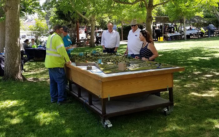 View of the 2022 Public Works Open House including an image of an MPWD exhibit