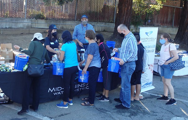 Photo of staff at the MPWD booth during National Night Out at the Carlmont Shopping Center on August 3, 2021