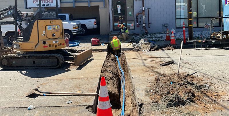 photos of construction work along Old County Road.