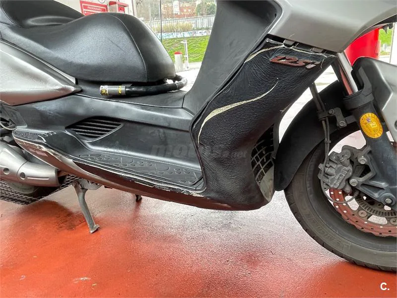 Kymco Super Dink 125i – Vista 7