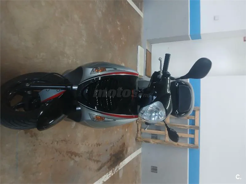 Honda Passion 125i – Vista 3